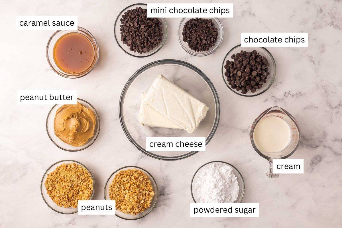 ingredients needed for snickers cheeseball in bowls.